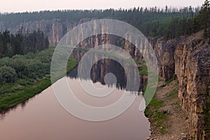 Top view of the river from a rocky shore.