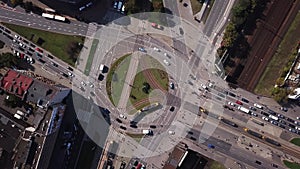 Top view of the road junctions. Aerial survey of highways of the road network. Machines moving at the intersection and denouement.