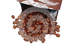 top view on roasted coffee beans spilled from plastic bag on white background