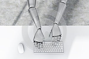 Top view of robot hands typing