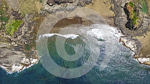 Top view of rock formations and crashing waves in Biri Island, Samar, Philippines. VIsible are Caranas, Bel-at, and Puhunan Rock