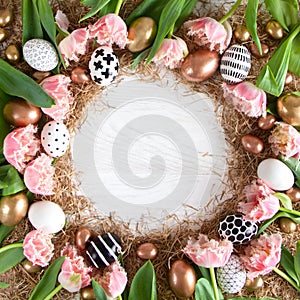 Top view of a round frame with pink tulips