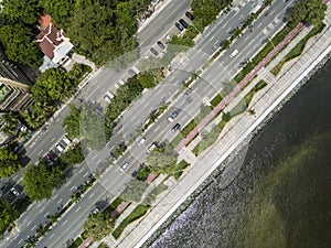 Top view of Roxas Boulevard and boardwalk, fronting Manila Bay. Coastal avenue in the capital of the Philippines. photo