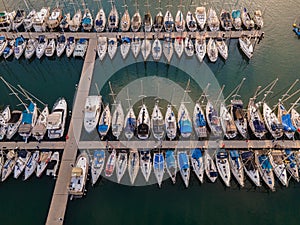 Top view of sailboats and small yachts on a sunny day