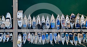 Top view of sailboats and small yachts on a sunny day