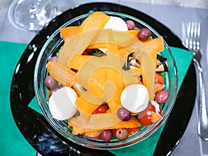 top view of salad from cherry tomatoes with carrot