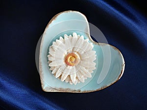 top view of Sam Pan Nee Thai Traditional Dessert handcraft royal famous thai snack in pastel blue heart shape plate