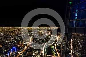 Top view of Santiago de Chile city and Sky costanera reflection