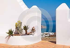 Top view of the sea and islands through the door in the garden.