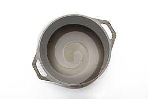 Top View of Seasoned Cast Iron Pan on White Background 