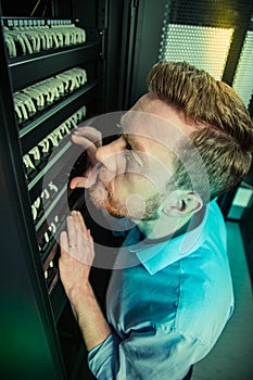 Top view of a serious smart bearded man