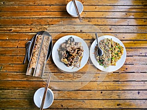 top view of served chinese dinner in rustic eatery