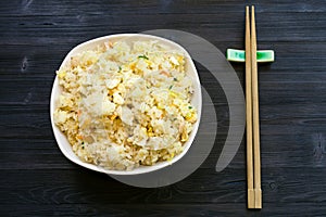 Top view of served Fried Rice with chopsticks