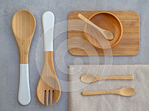 Top view set of Eco friendly wooden and bamboo cutlery. Plastic free and zero waste concept