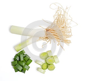 Top view set slice spring onions  with root on white background