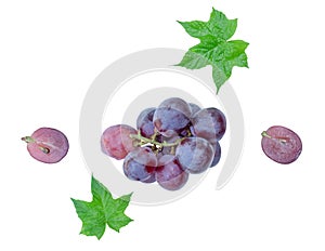 Top view set of small bunch of fresh red grapes with half and green leaves isolated on white background with clipping path