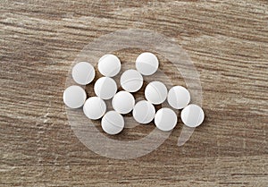 DHEA pills on a table top view