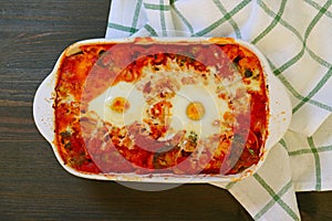 Top View of Shakshouka, a Dish of Poached Eggs in Flavorful Tomato Sauce