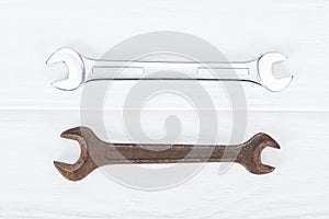 Top view of shiny and rustle on white wooden surface photo