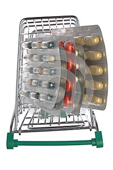 Top view shopping cart with different pills photo