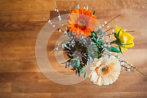 Top view shot of a bunch of flowers with orange and yellow Gerbera, Asteraceae, Plantae