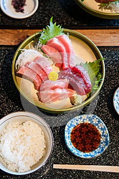 Top view shot of Fresh salmon, tuna, toro, maguro, otoro sashimi with wasabi on ceramic plate, Japanese food set