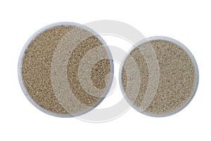 Top view of the Silica sand specimens on small trays in isolated background