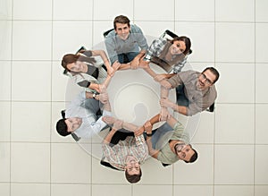 Top view.single business team sitting at the round table