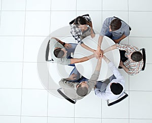 Top view.single business team sitting at the round table