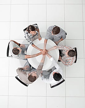 Top view.single business team sitting at the round table