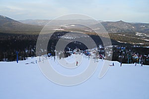 Top view of a ski resort and long downhill route