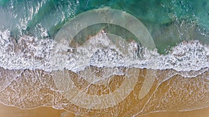 Top view from sky of sea wave and sand beach landscape