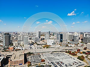 Top view skyscraper buildings in uptown Dallas with colorful aut