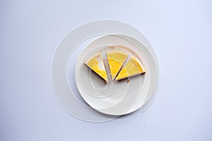 top view of slice of cheese cake on a plate