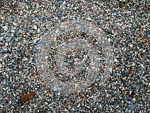 Top view of small and large stones on the ground