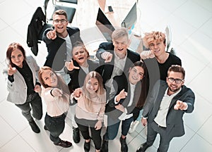 Top view. smiling young business team looking at the camera