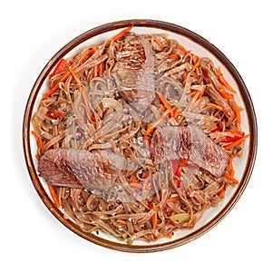 Top view, Soba beef and vegetables, Buckwheat noodles on white background. Traditional Asian food, Wok menu.