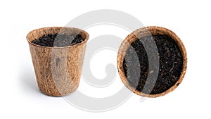 Top view of soil in coconut coir fibre pot. Growing flower and plant tree. Natural gardening isolated on white background