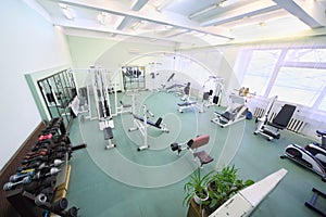 Top view on spacious empty gym with special