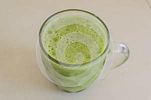 Blend of Spondias Dulcis, Spinach, Giner, and Lime photo