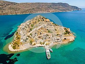 Top view of Spinalonga island with calm sea.