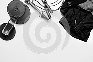 Top view of Sport stuff on white background. Fitness lifestyle concept. Free space for text