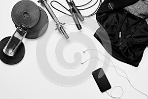 Top view of Sport stuff on white background. Fitness lifestyle concept. Free space for text