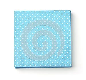 Top view of stacked blue dot paper napkins