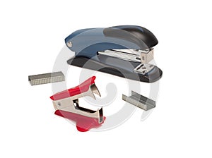 Top view of stapler, staple remover and staples isolate on white background.