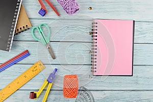 Top view of stationery tools and notebook with copy space