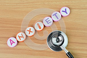 Top view of stethoscope and alphabet letters with text ANXIETY. Conceptual image