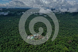 Top view, still video of an oil pumping platform in an oil field of the Amazon rainforest of South America