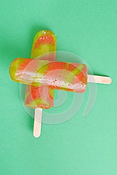 top view strawberry and kiwi popsicle
