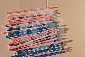 Top view on straws for gender reveal party, birth child baby shower concept boy or girl